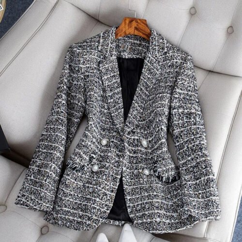 Stilig svart tweed blazer for damer, perfekt for formelle anledninger.